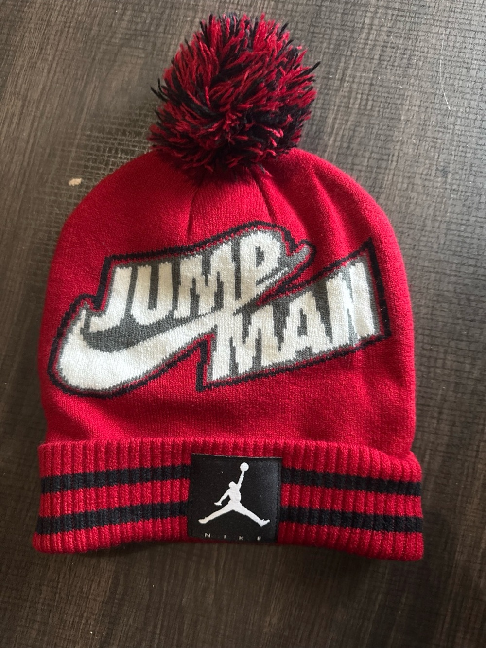 Nike Kids Red and Black Pom Beanie with Jumpman Graphic